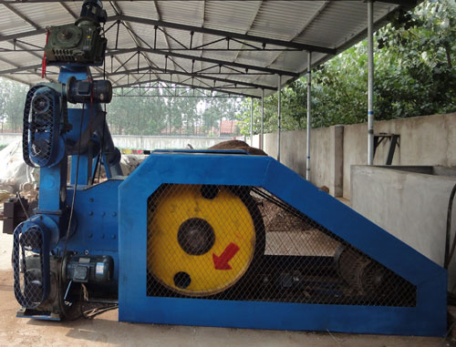 Mechanical stamping biomass briquette press